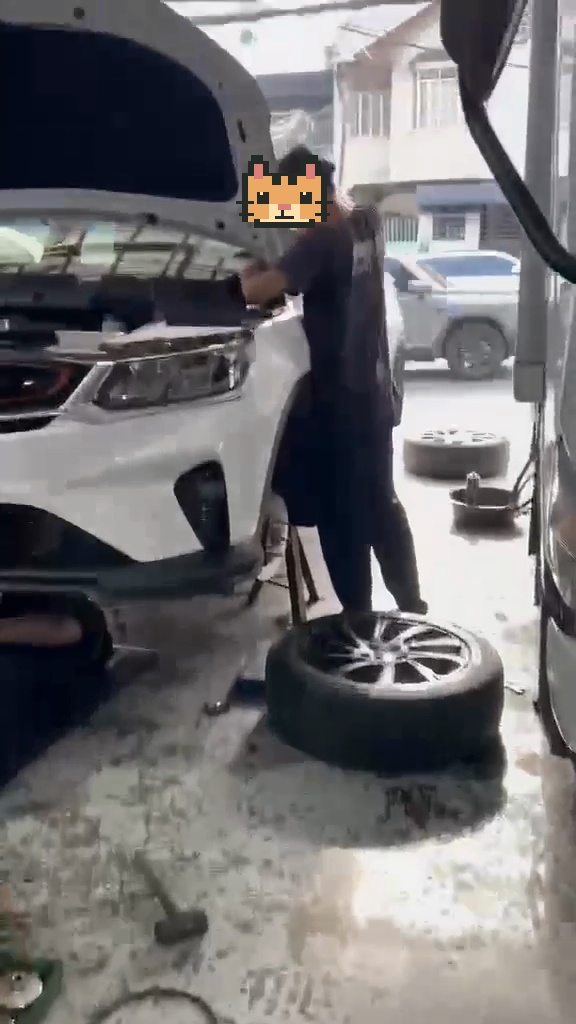 A field operator working on a vehicle