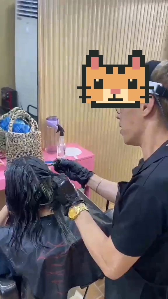A barber at work in a local shop