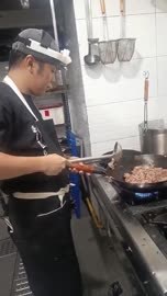 Chef cooking with quest headset